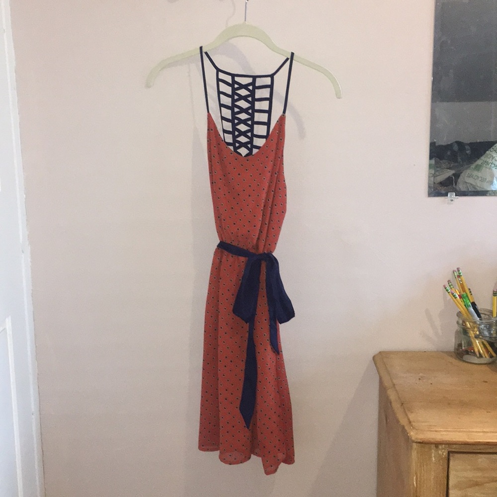Strappy- backed polka dot dress